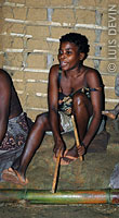 Pygmy percussionist of a struck idiophone