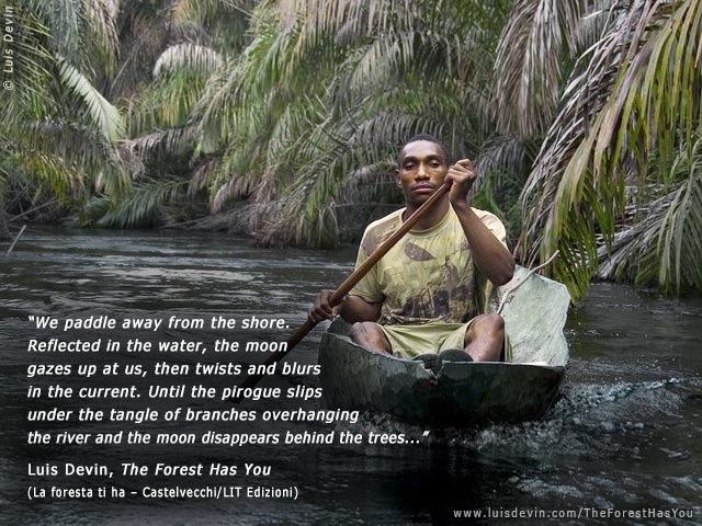 Pygmy pirogue on a river, from Luis Devin's anthropological research in Central Africa (Baka Pygmies, Gabon)