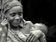 Woman with a baby (Baka Pygmies, Cameroon)